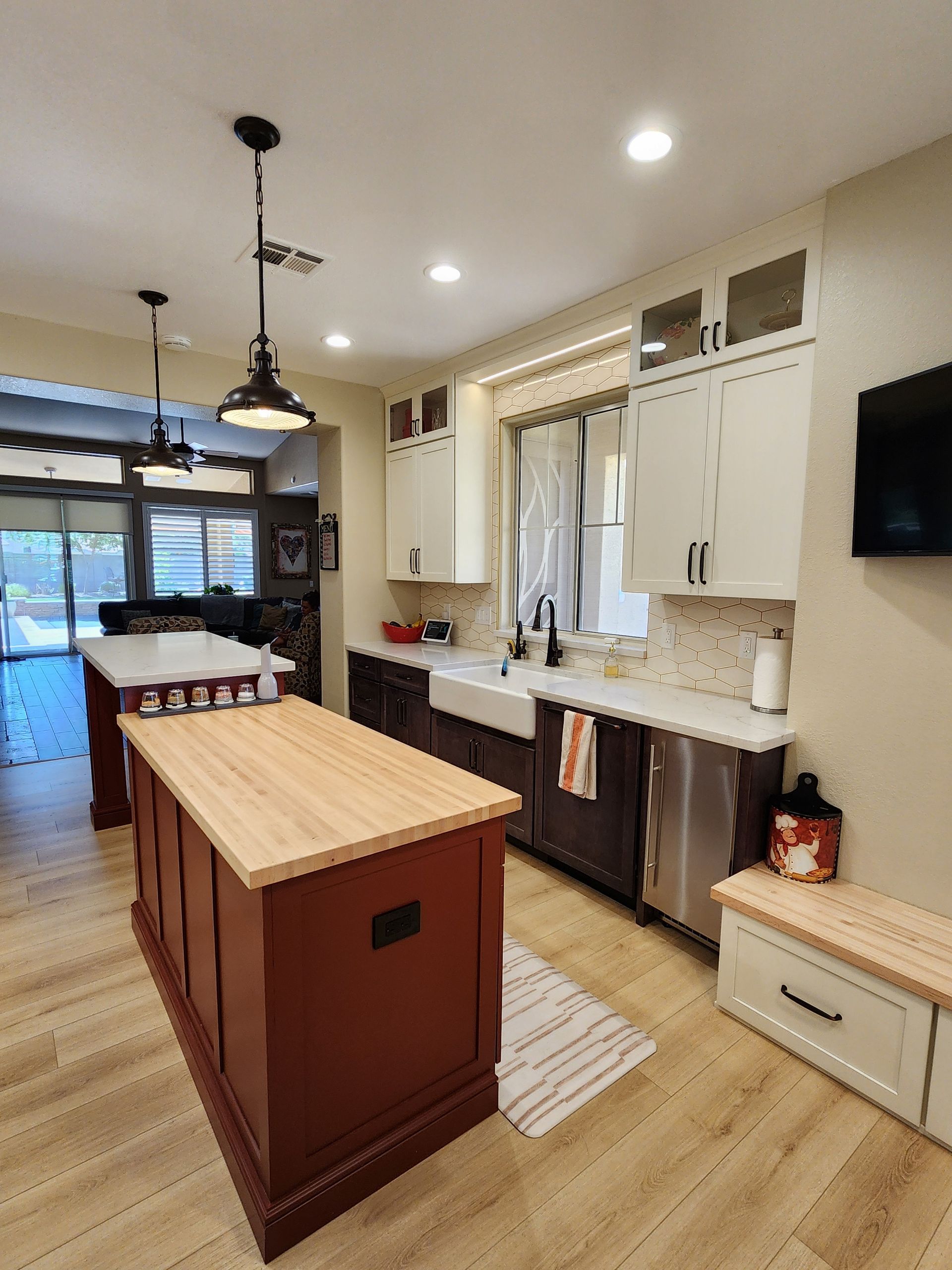 There is a large island in the middle of the kitchen.