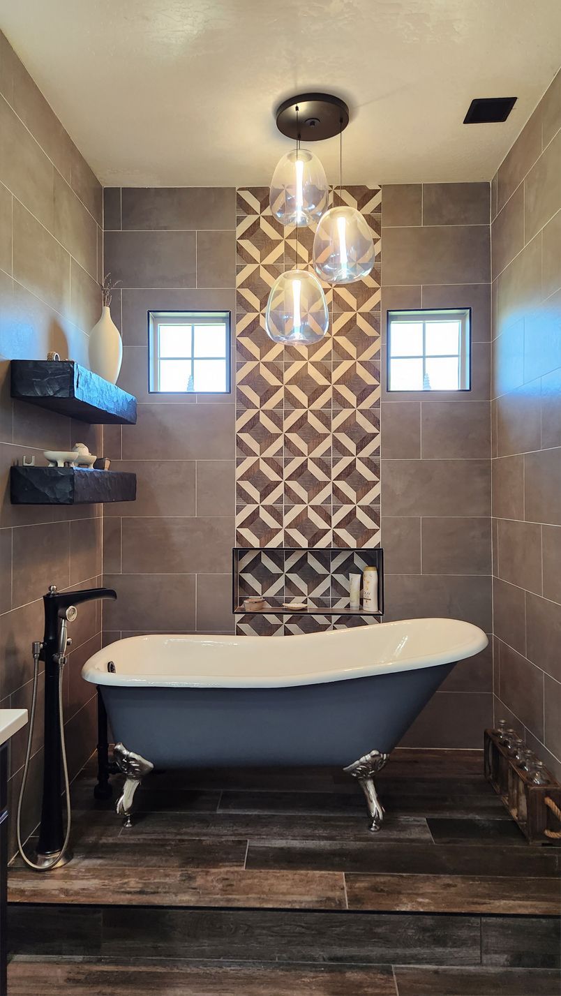 A bathroom with a bathtub and a sink.