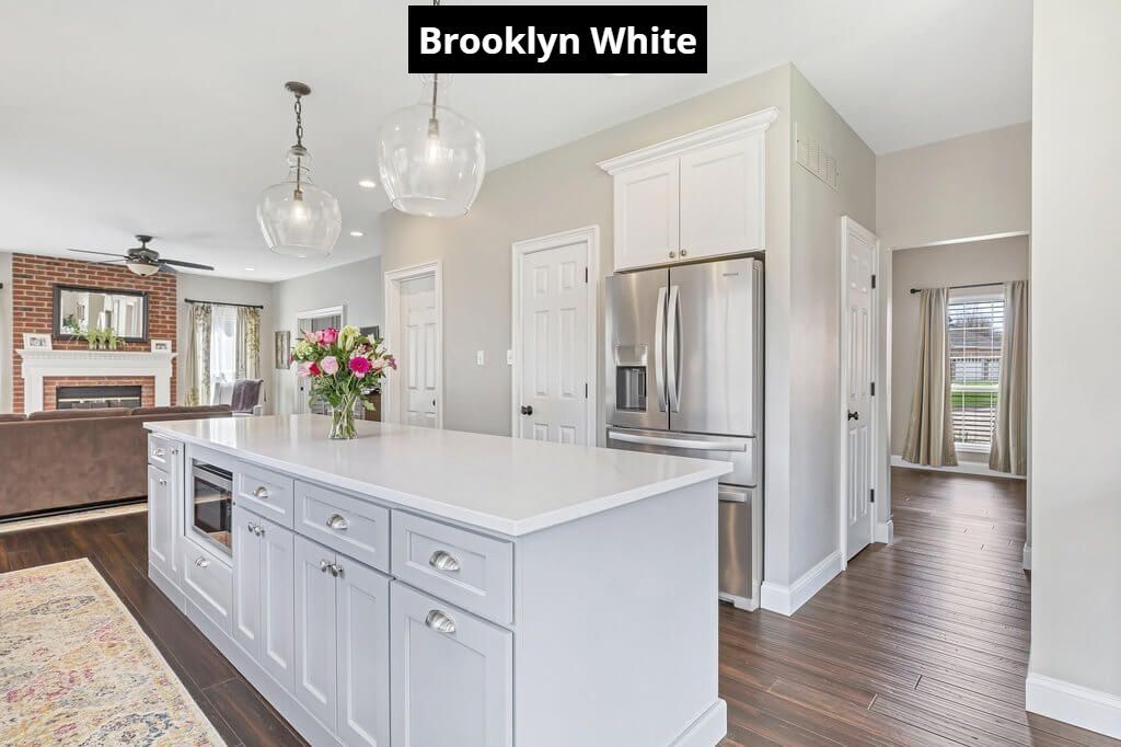 There is a large island in the middle of the kitchen.