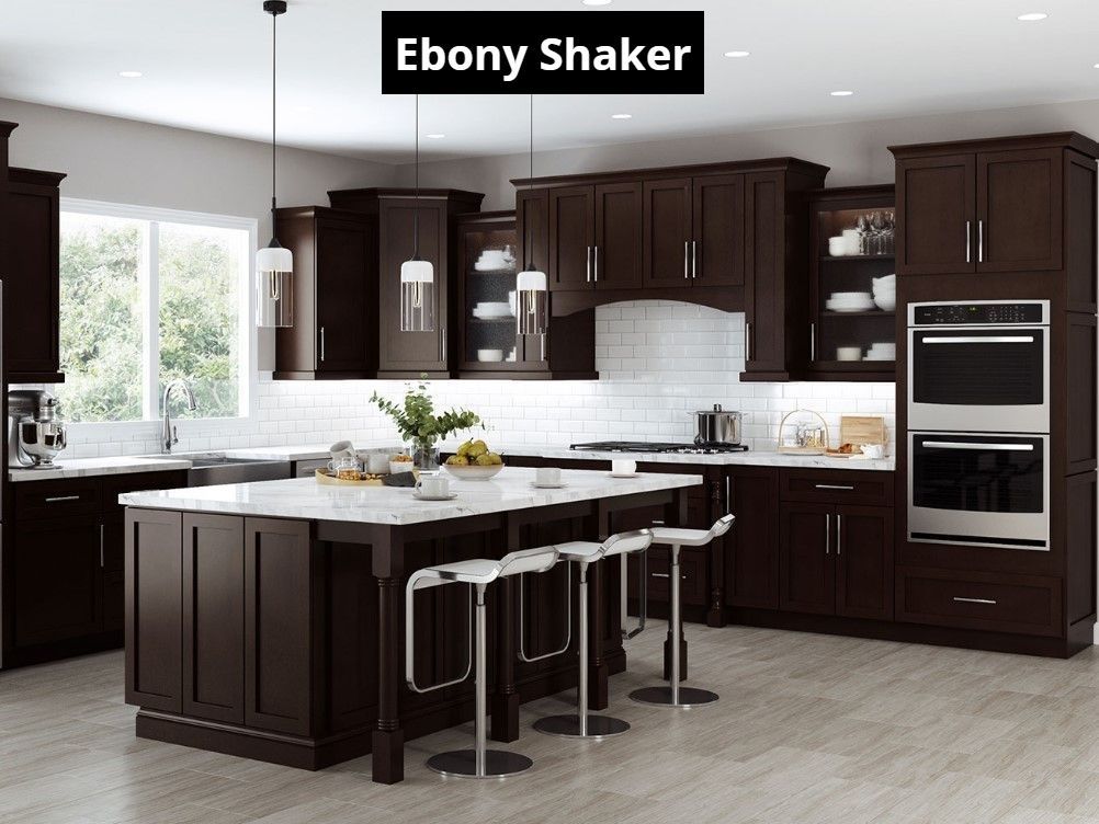 A kitchen with brown cabinets , white counter tops , stainless steel appliances and a large island.