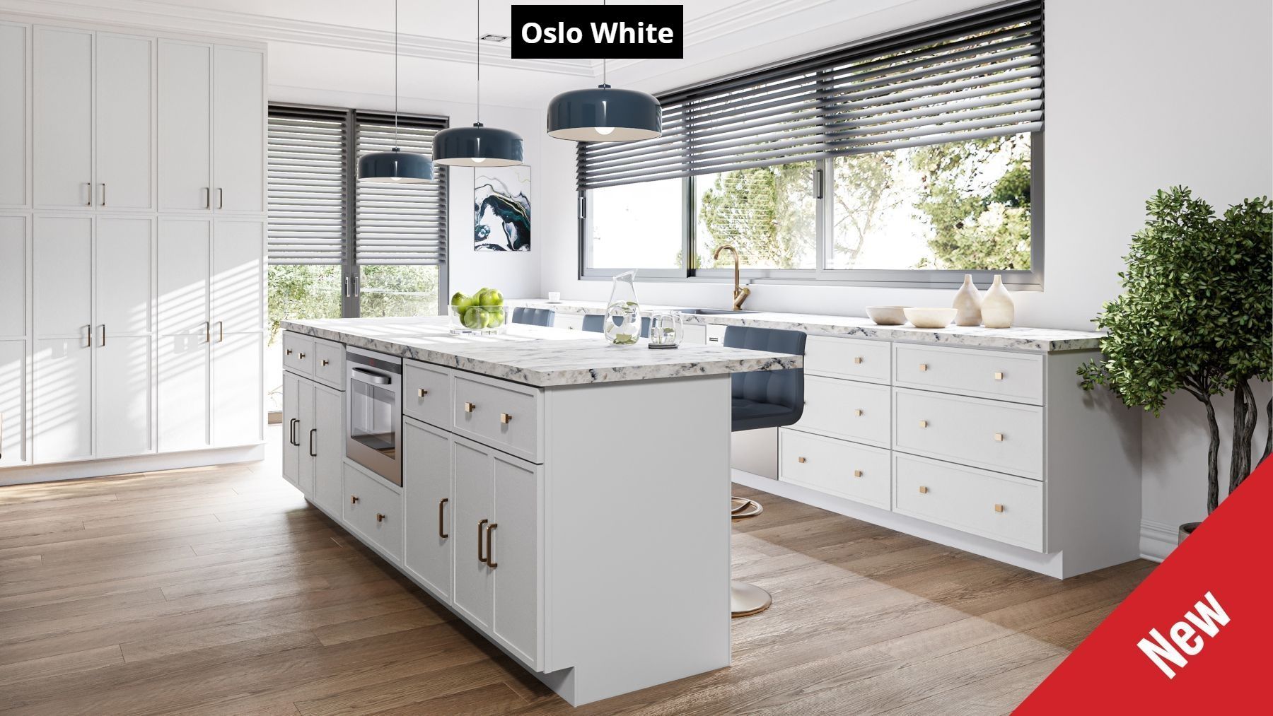 A kitchen with white cabinets and a large island in the middle.