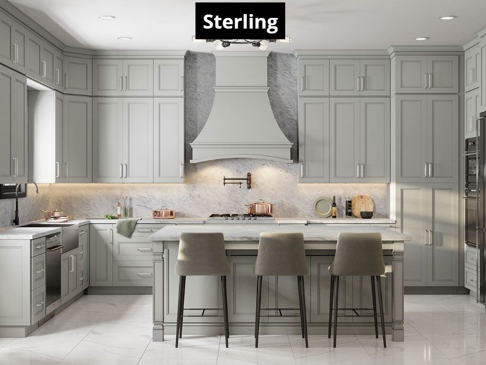 A kitchen with gray cabinets , stainless steel appliances , and a large island.