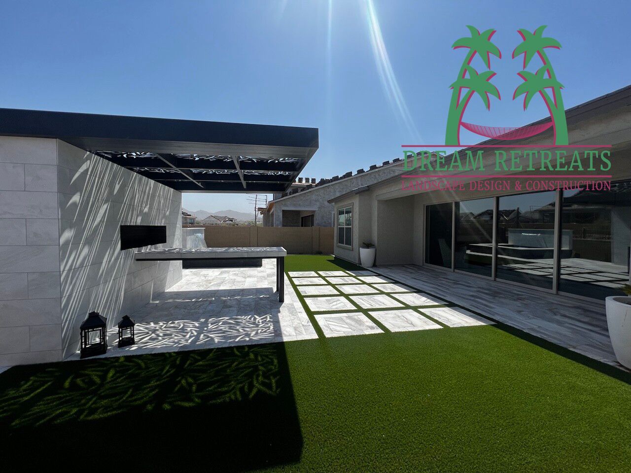 A dream retreats logo is on the side of a house