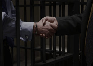 Shake hand in the jail