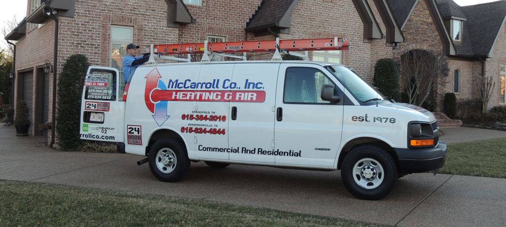 A white van with decorator co. inc. written on it