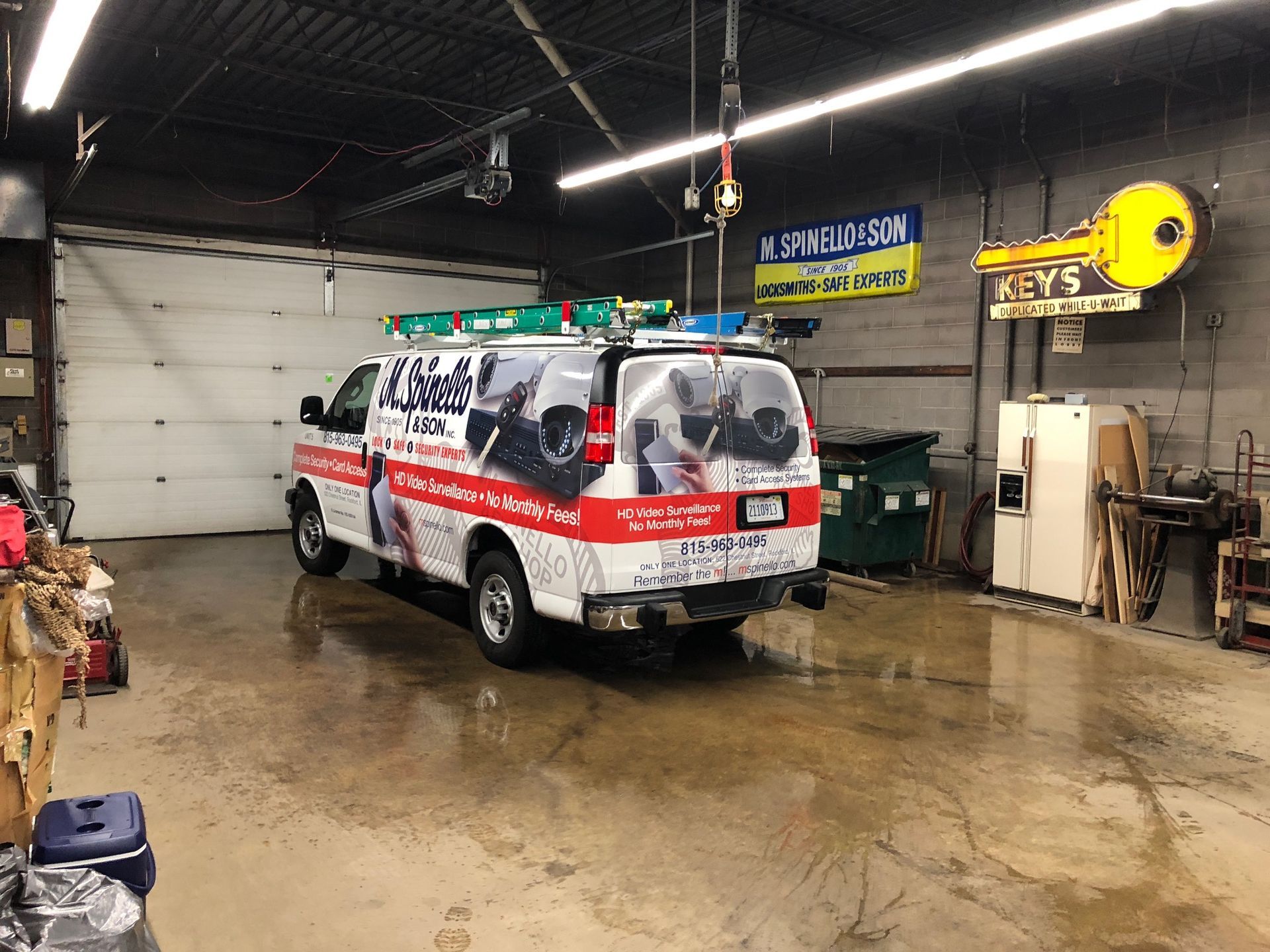 Van parked inside garage; 
