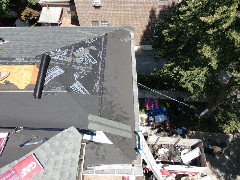 An aerial view of a roof that is being installed
