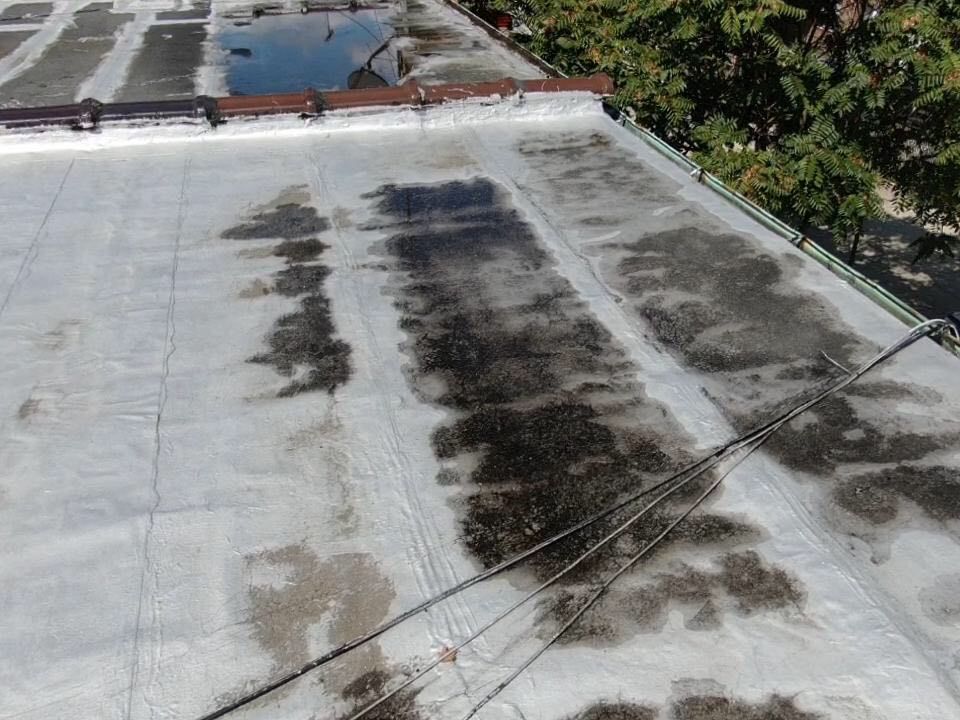 A roof with a lot of stains on it