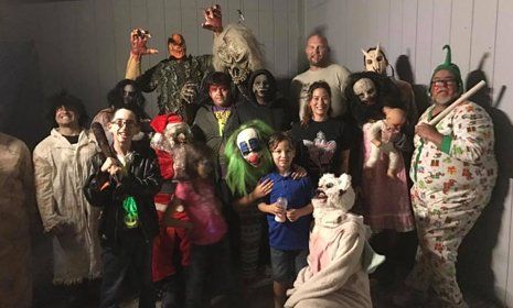 Group of people in Halloween costumes