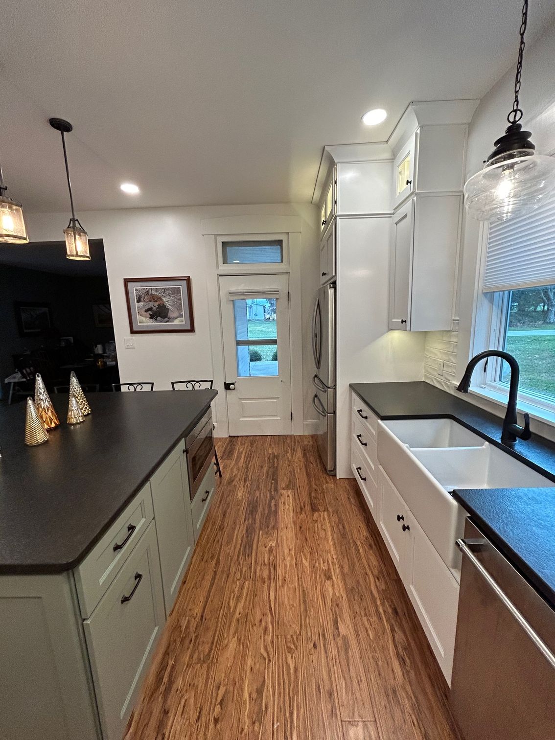 a kitchen with a large island in the middle of it