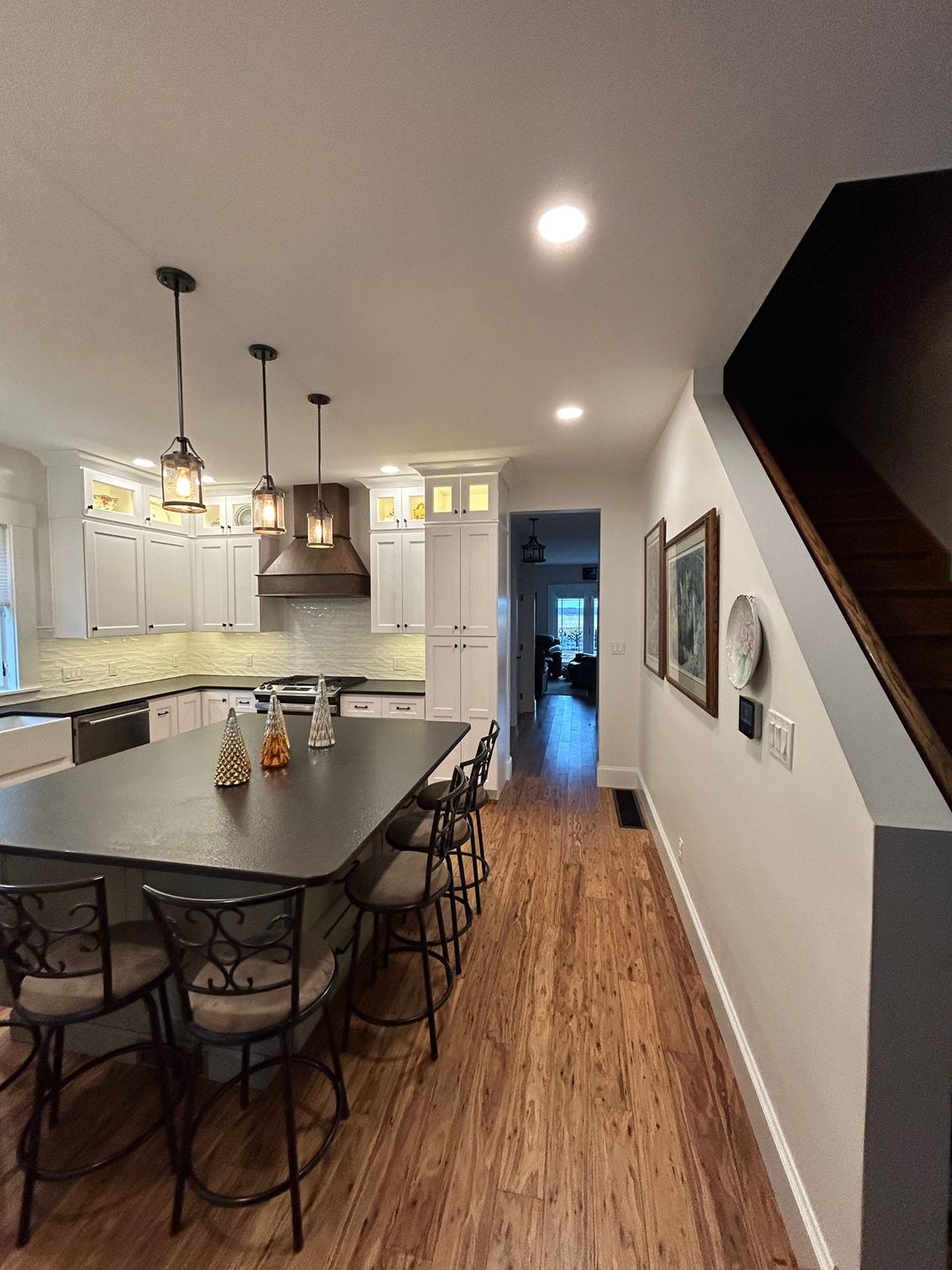 a kitchen with a large island in the middle of it