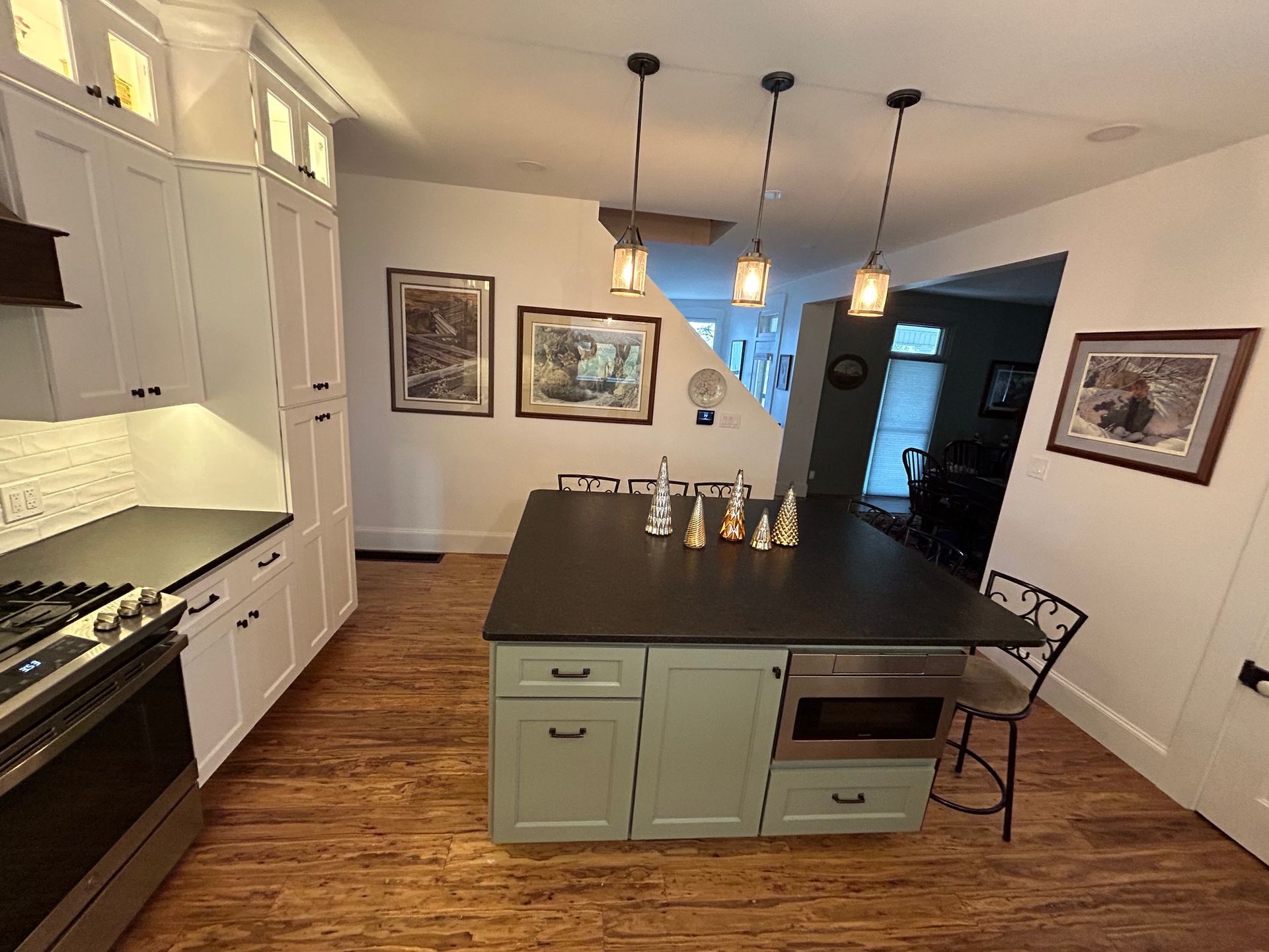 a kitchen with a large island in the middle of it