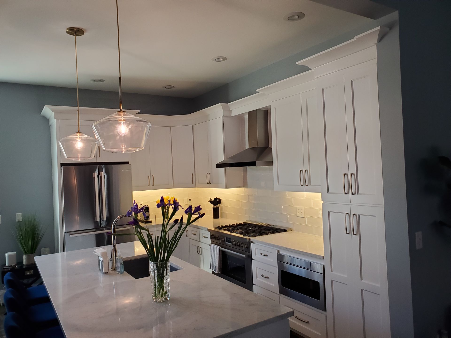 White kitchen cabinets and white countertop