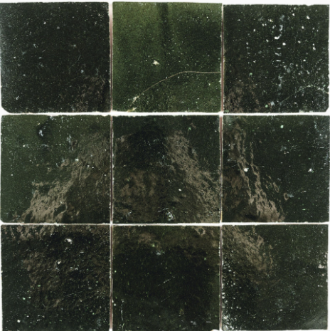 'Handcrafted 4x4 Zellige tiles in a deep, lush green hue, featuring a glossy, textured finish with irregularities that add character and depth to the tile's surface.'