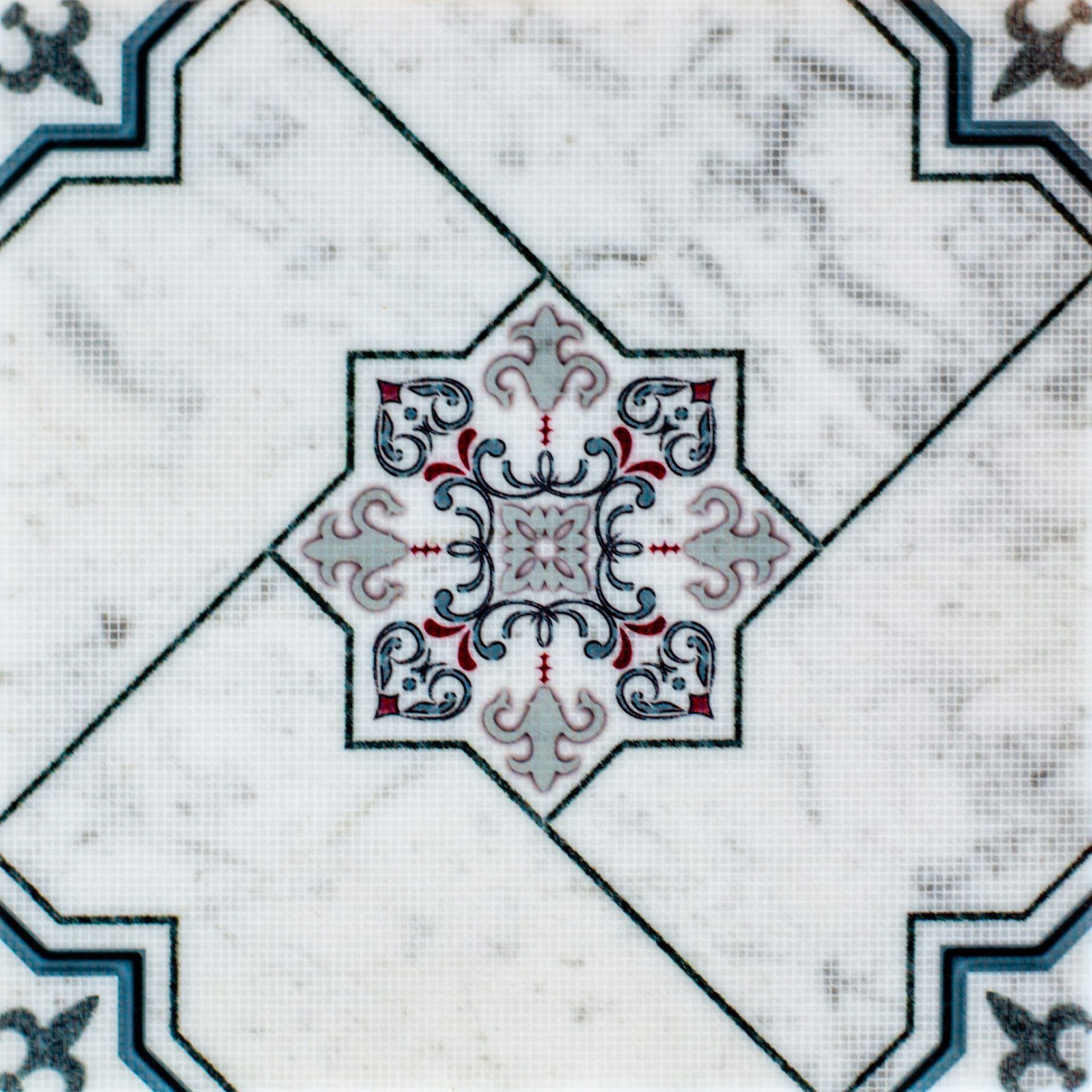 Decorative tile with white marble and a central star-shaped design in grey, red, and blue.