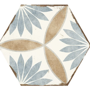 Hexagonal tile with a floral design in blue and tan on a cream background.