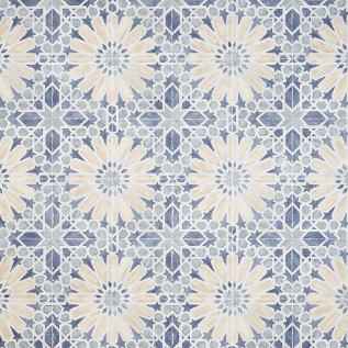 Decorative blue and cream floral patterned tile.