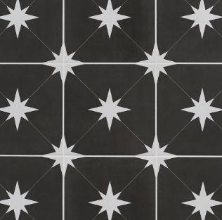Black and white starburst patterned tiles in a grid formation.