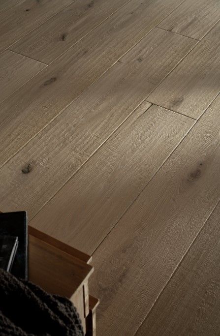 Light brown wood flooring with natural wood grain.