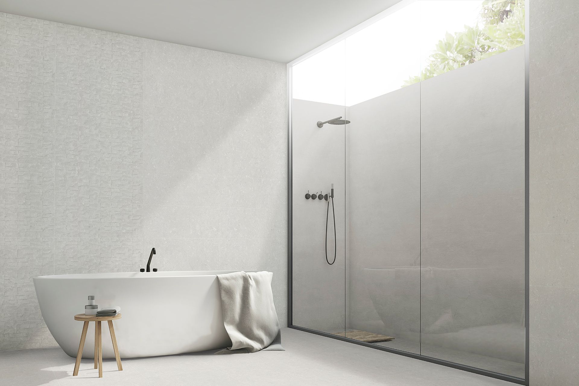 Modern white bathroom with a tub and glass shower, with a wooden stool.
