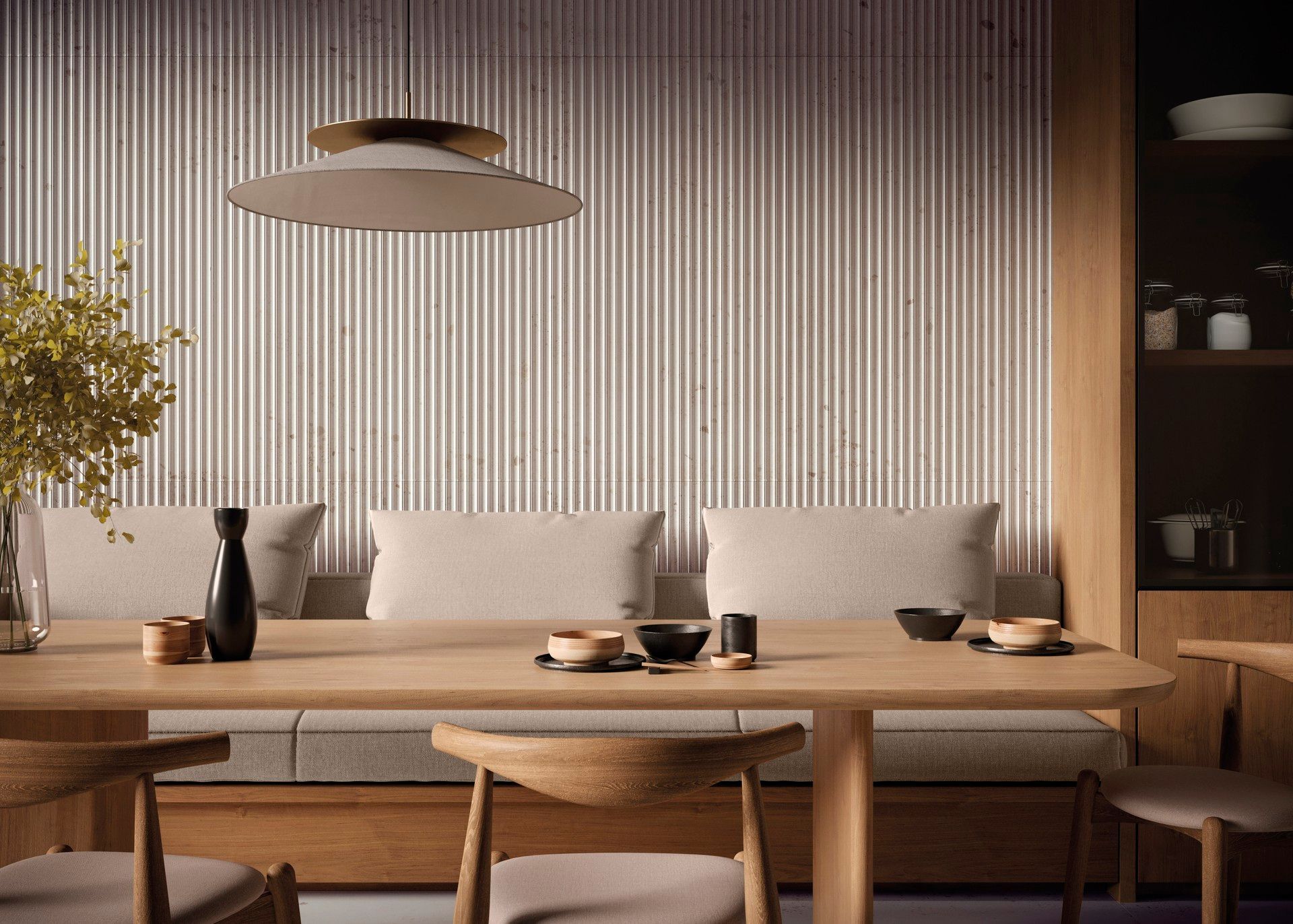 Wooden dining room with table, bench, chairs, pendant light, and striped wall.