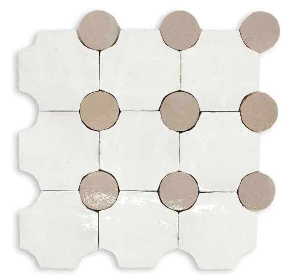White and tan decorative tile pattern.