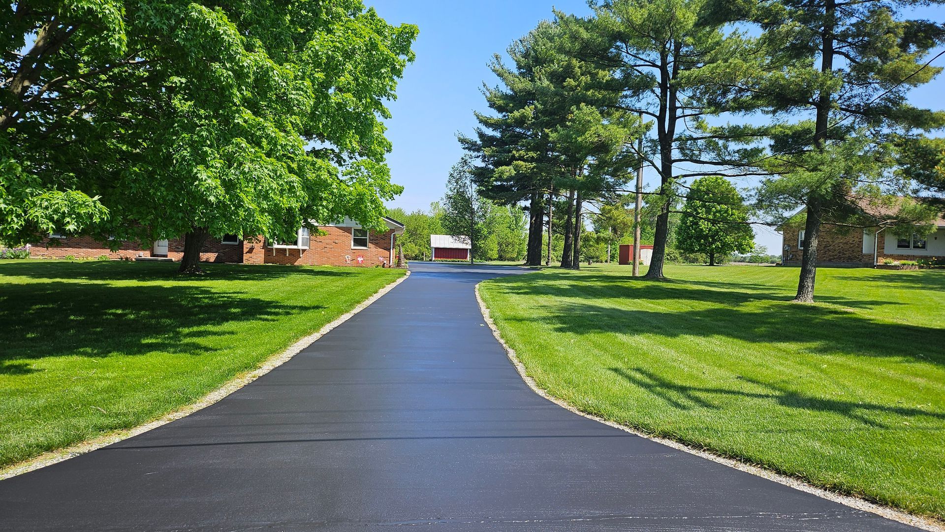 Driveway sealcoating