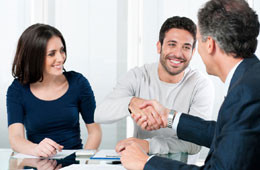 Couples consulting with an attorney