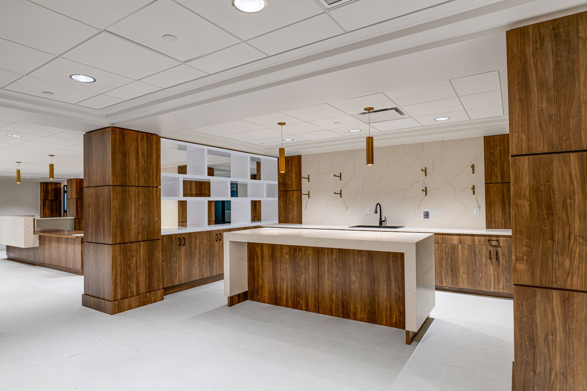 There is a large island in the middle of the room.