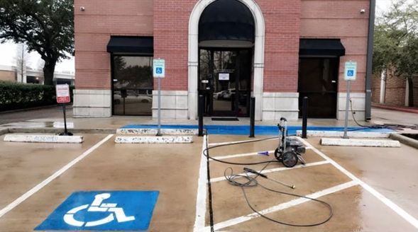 A clean parking area after pressure washing