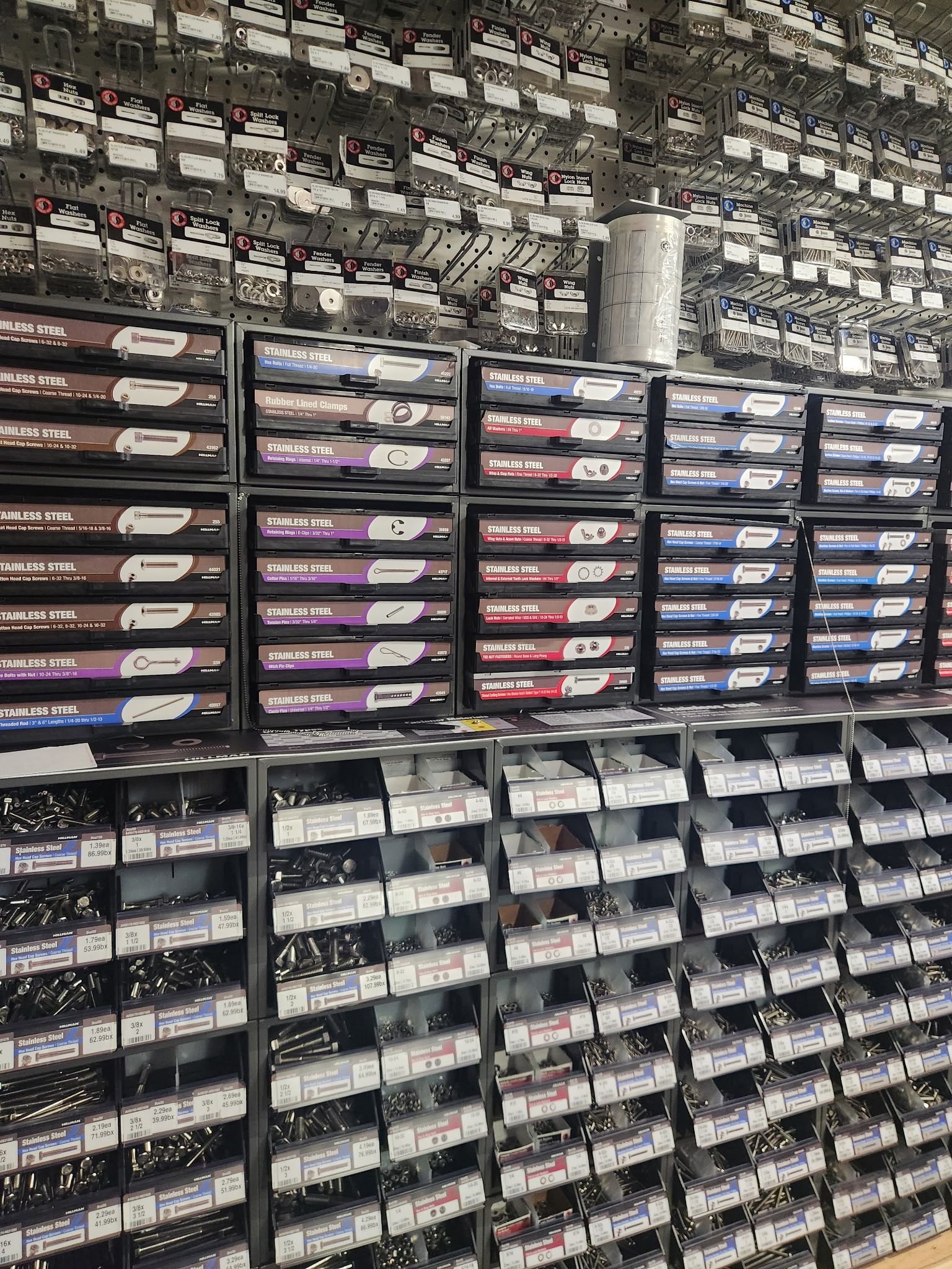 A warehouse filled with lots of different types of screws and nuts.