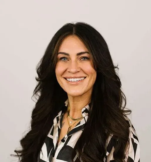 Photo of {{Team Member Name}}