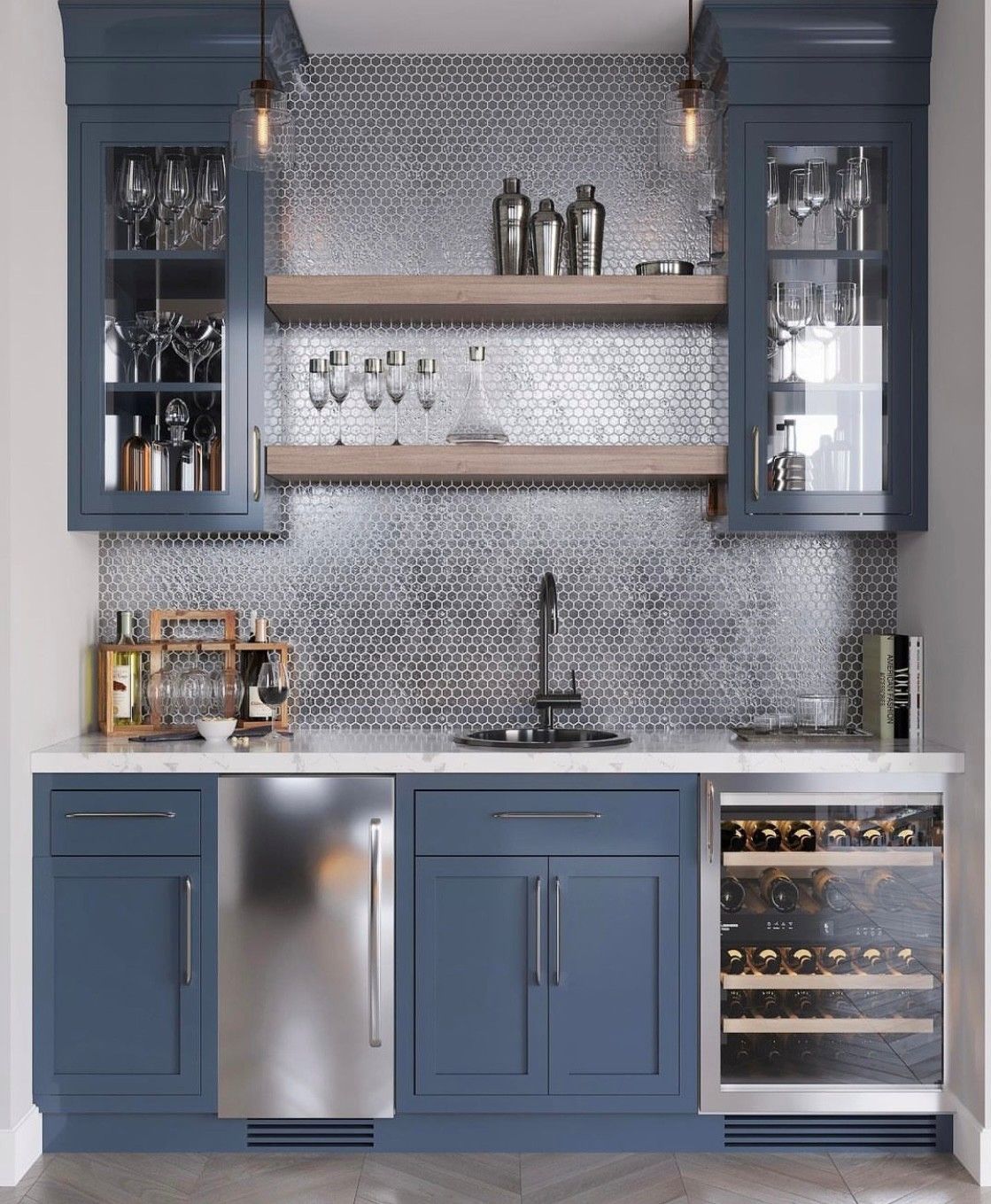 Blue home bar with cabinets, shelves, sink, and wine cooler against a mosaic backsplash.