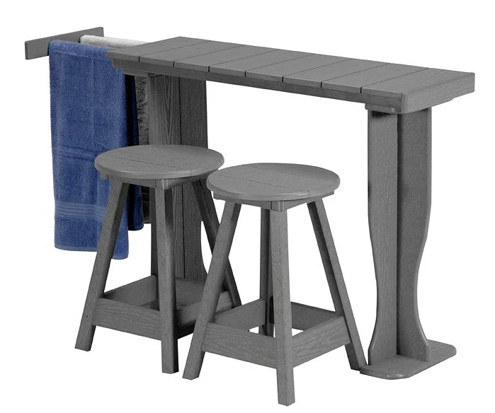 Gray wooden bar-height table with two stools and a blue towel hanging on the side