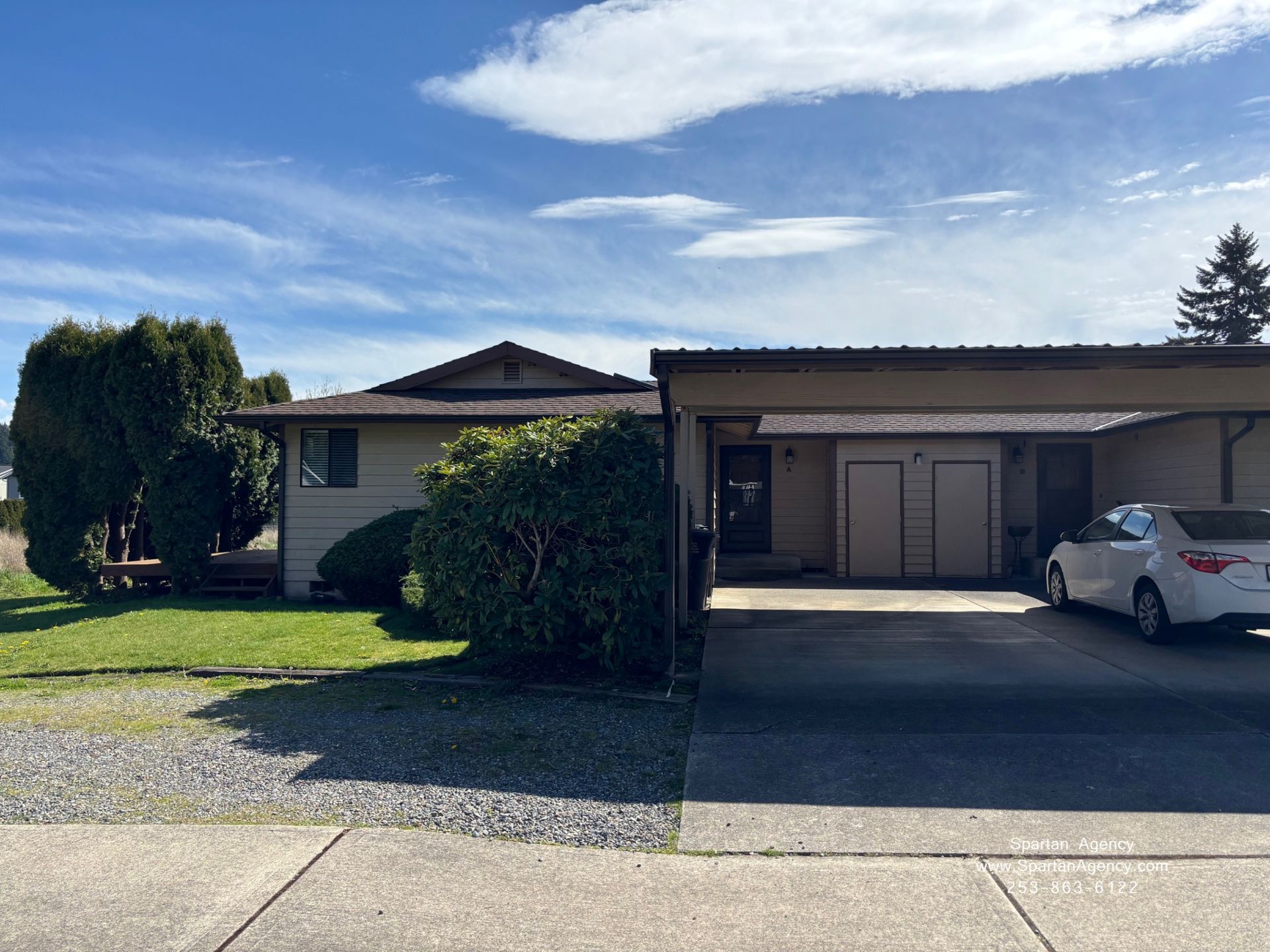 Single story, light brown with dark brown trim 