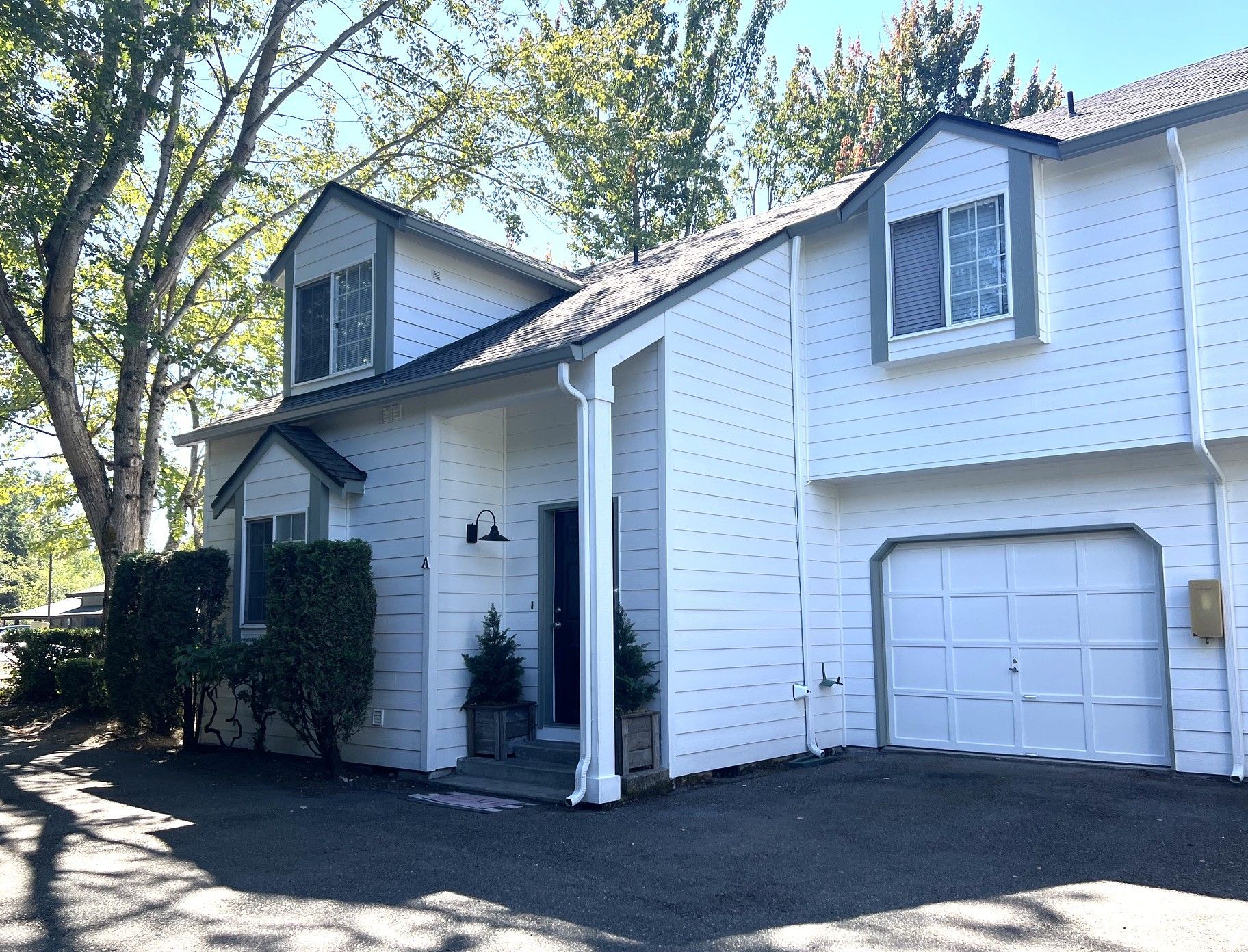 Two story townhouse white siding