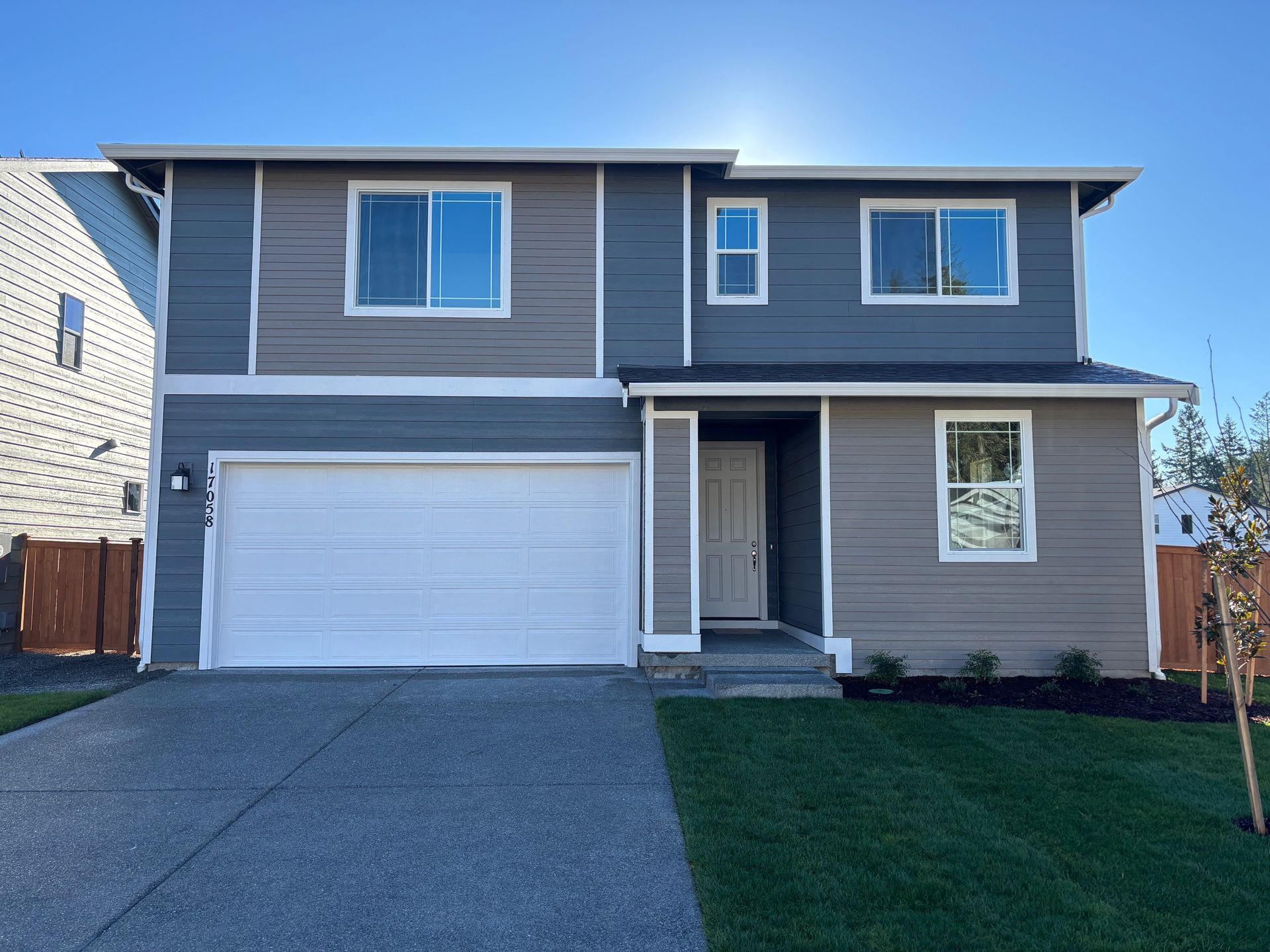 17058 126th St E, Bonney Lake WA 98391 Two story house blue and tan