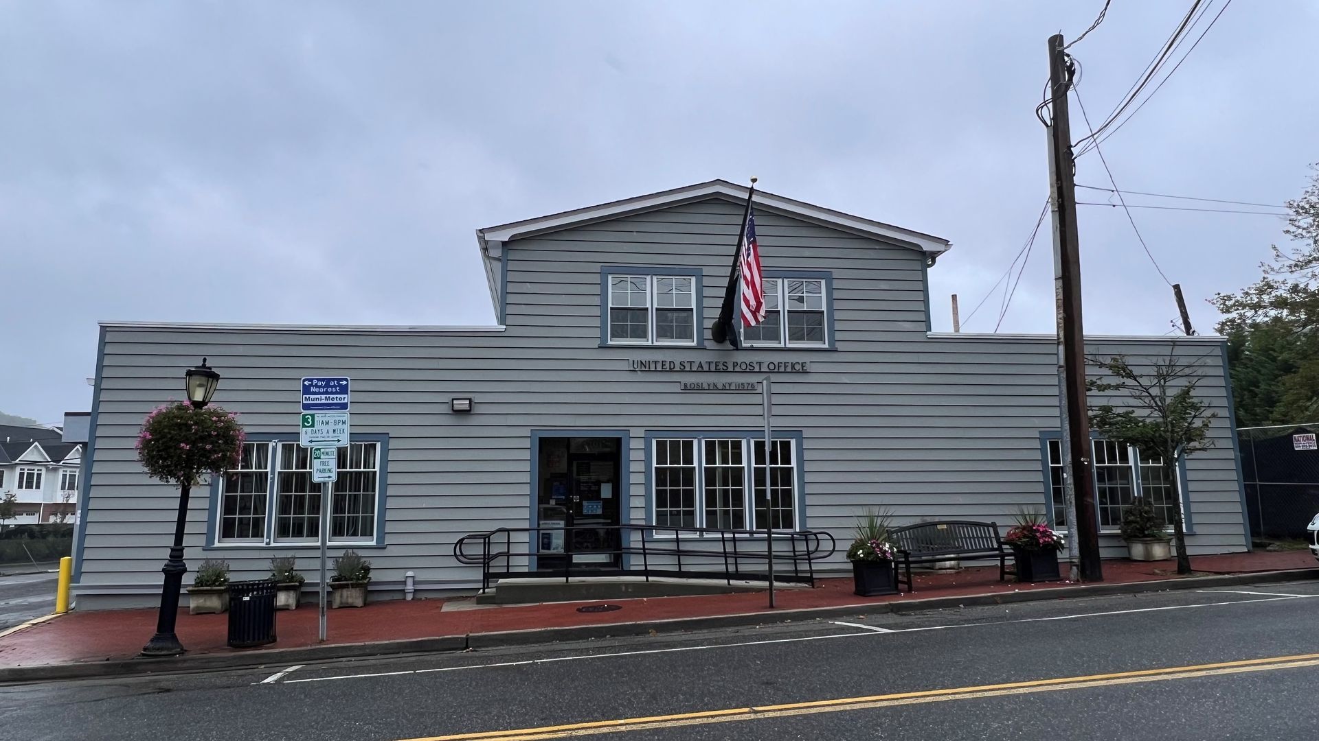 A large building with a flag on top of it
