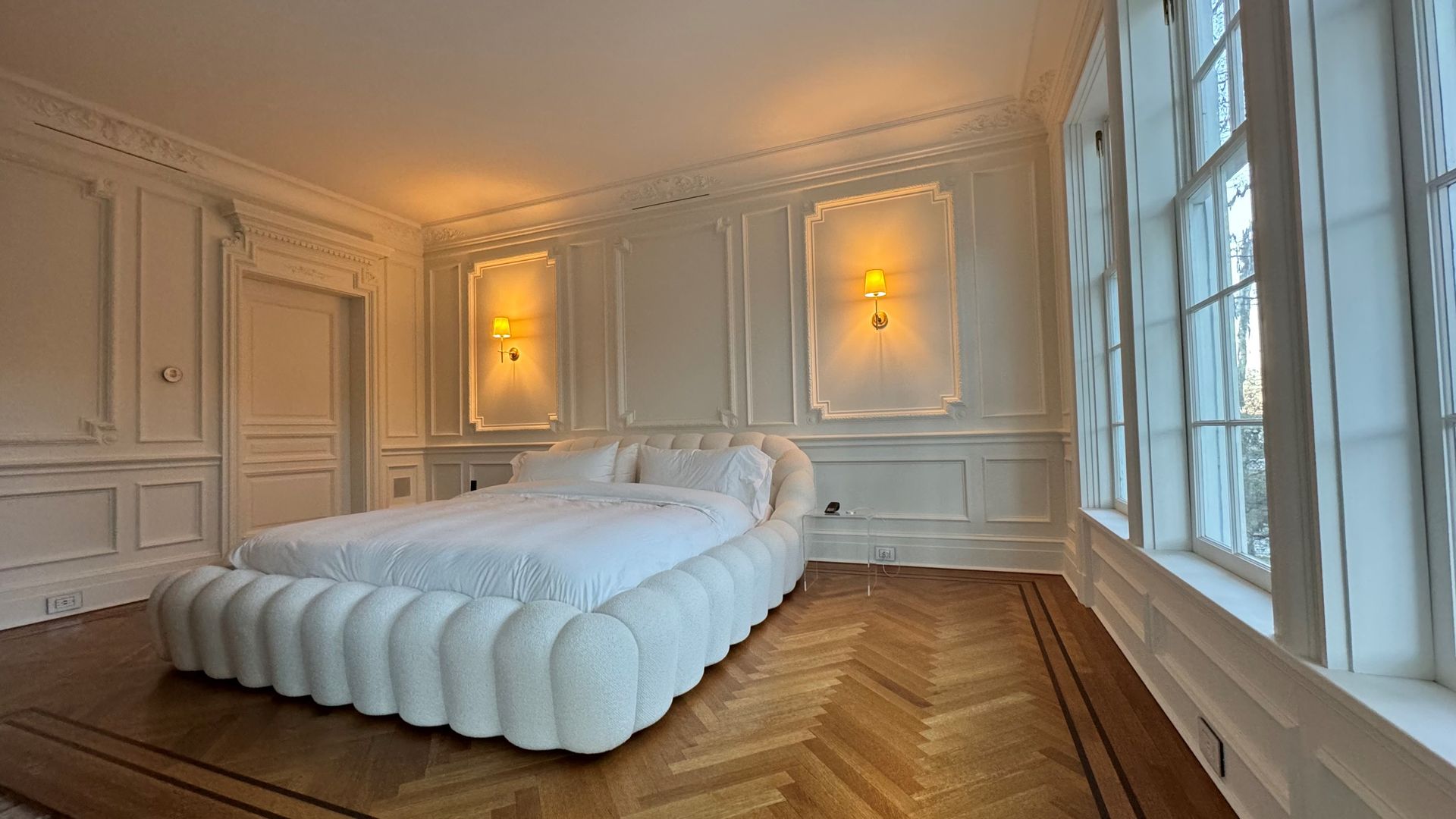 There is a large bed in the middle of the room.