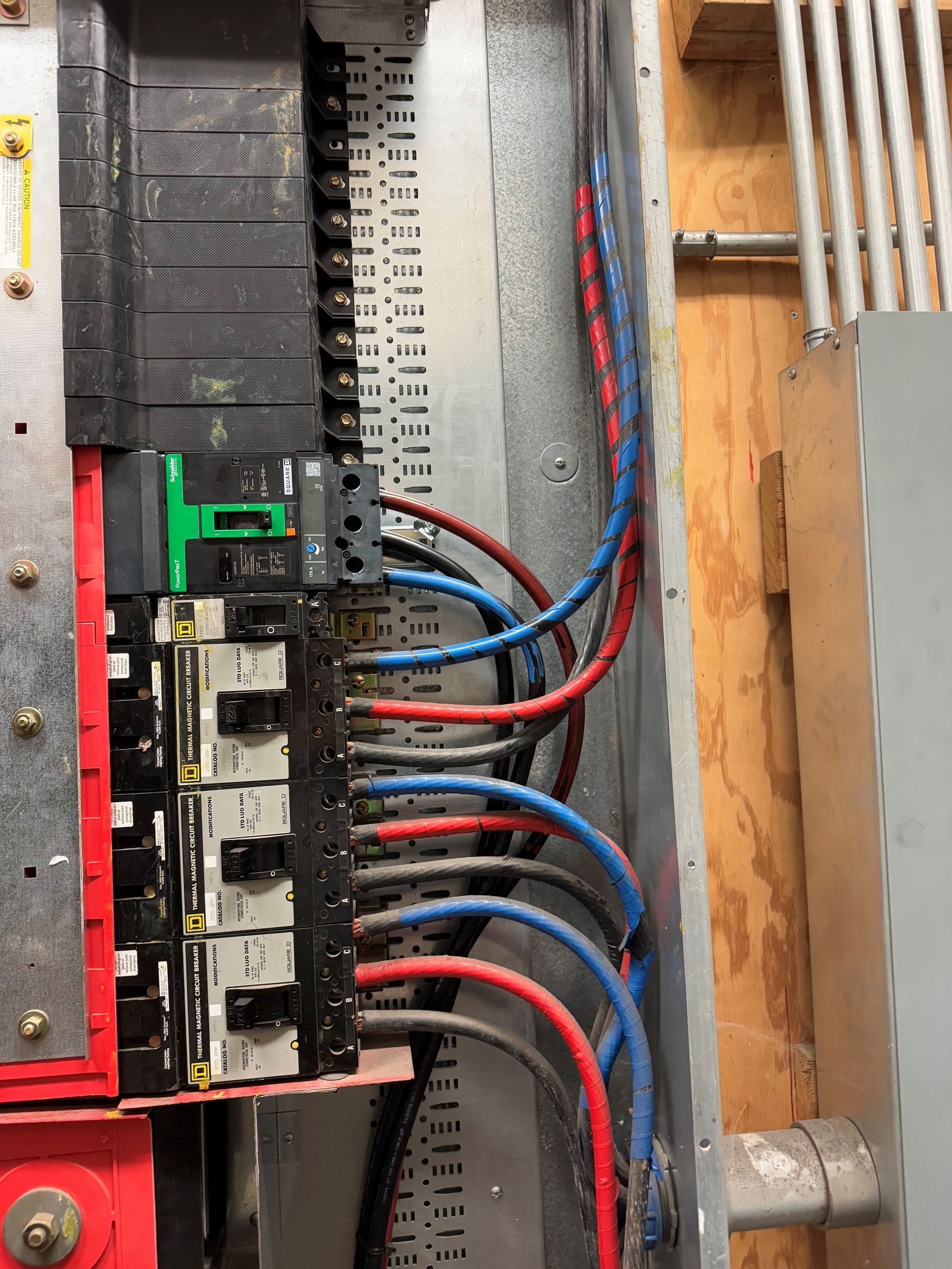 A bunch of wires are connected to an electrical box.