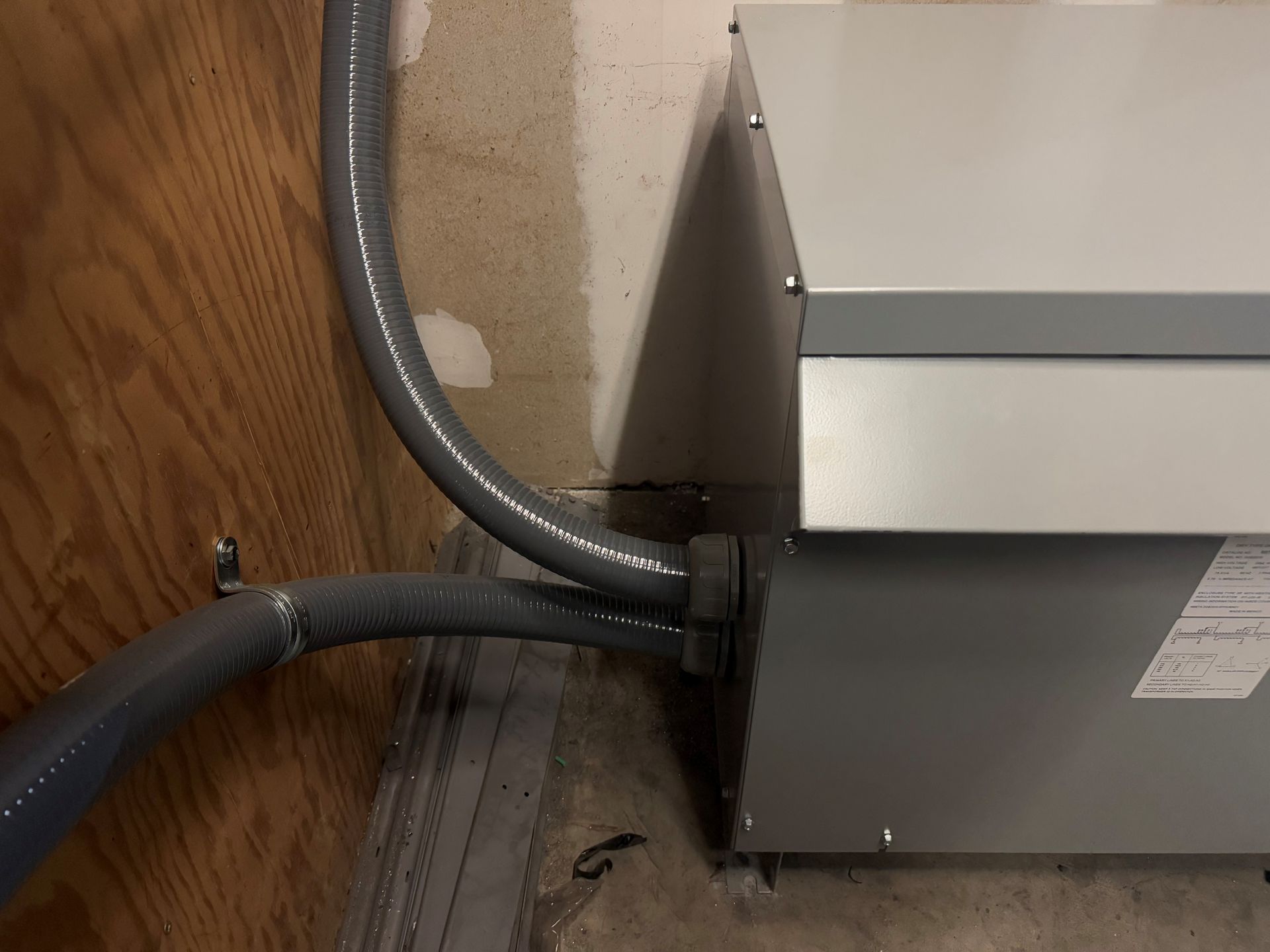 A box with a hose attached to it.