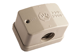 A tan, rectangular Pet Stop®  electronic pet containment collar receiver with a paw print logo and battery status light.