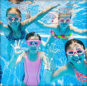 Children having fun under the water