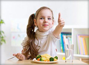 Child eating healthy meals