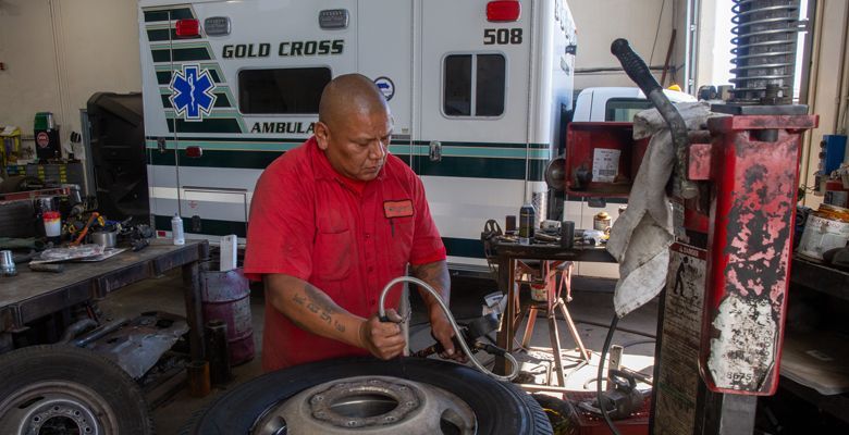 Gold Cross Ambulance tire repair