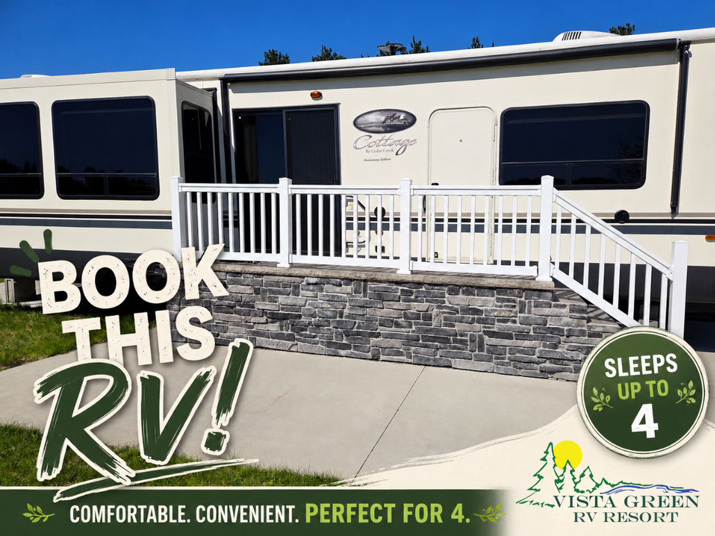 White RV with porch and stairs