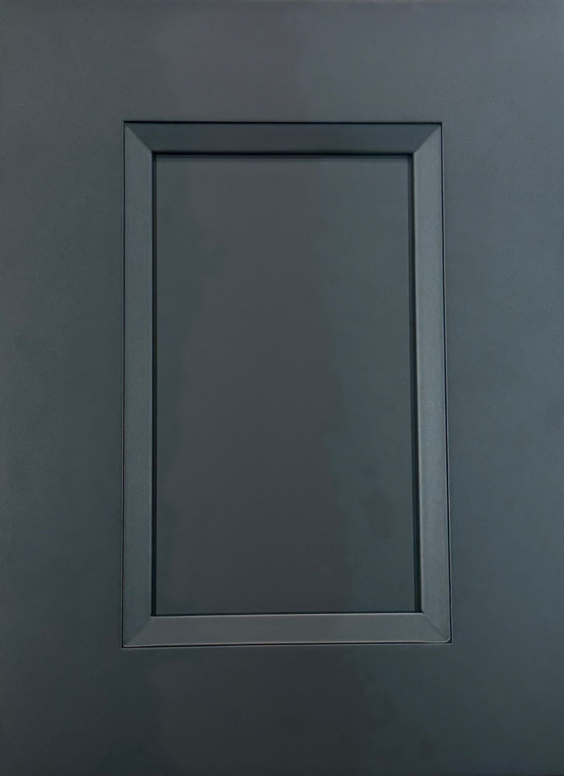 Rectangular gray framed window on a gray surface.