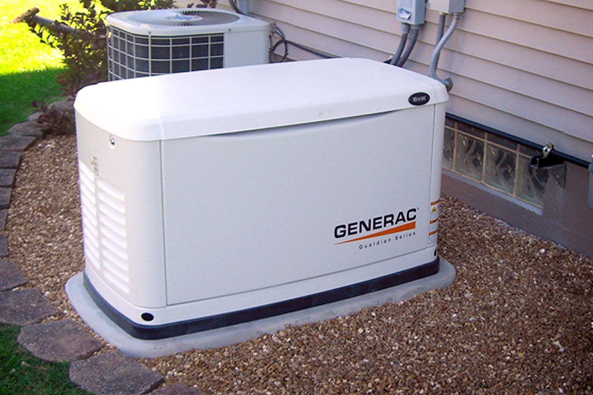 A generac generator is sitting outside of a house