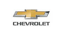 Chevrolet logo: gold bowtie emblem with chrome outline above black Chevrolet text