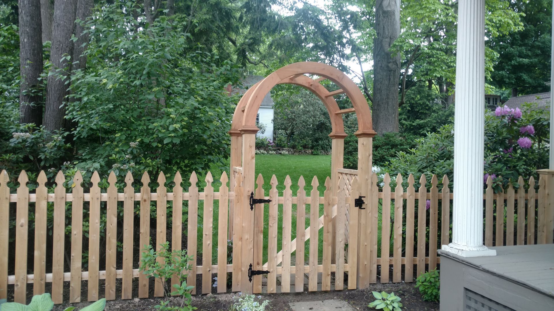 wood arch pergola
